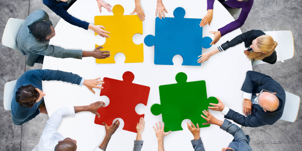 Business People Jigsaw Puzzle Collaboration Team Concept